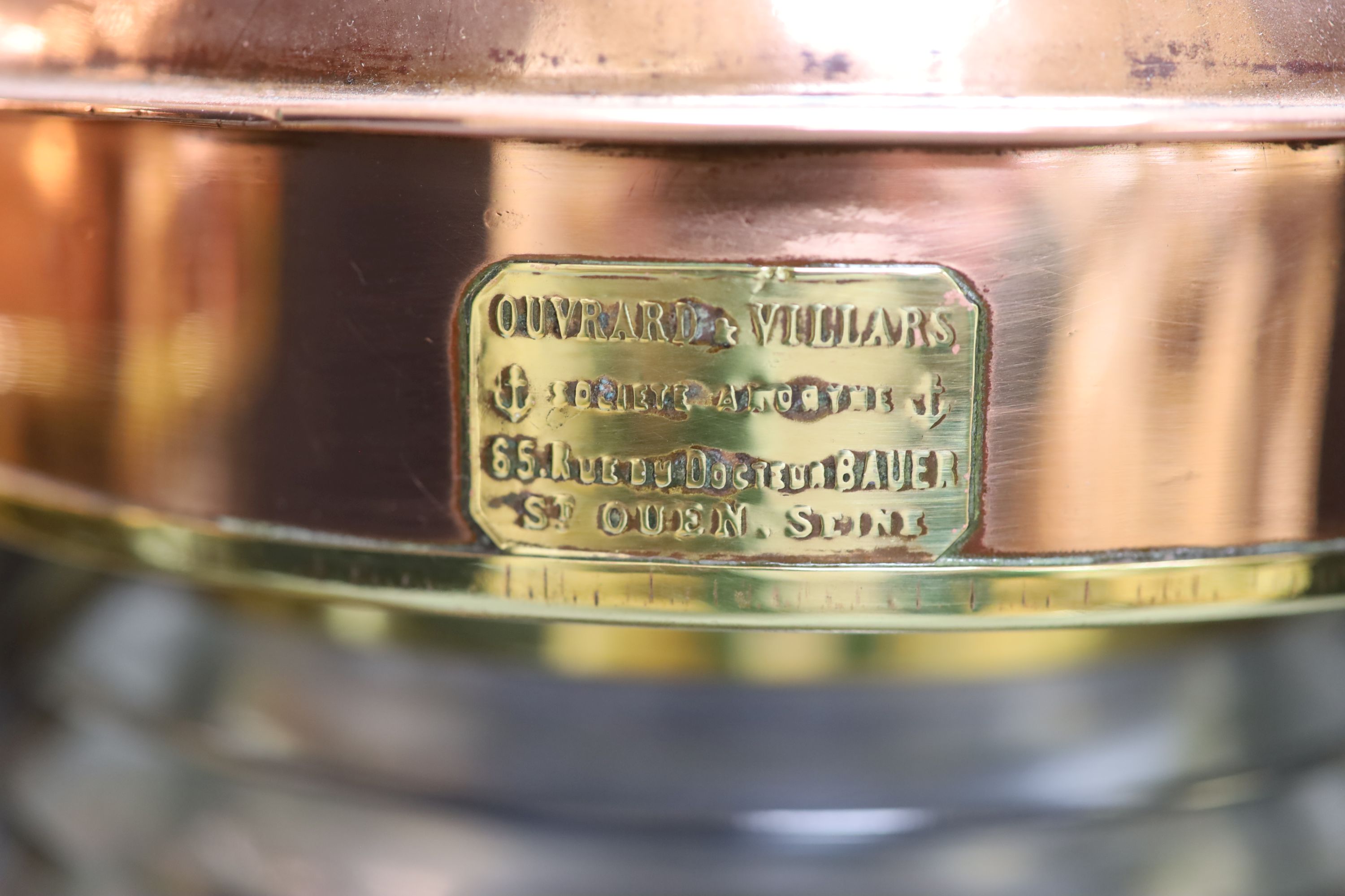 A pair of Ouvrard & Villars copper and brass ship lanterns, height 36cm